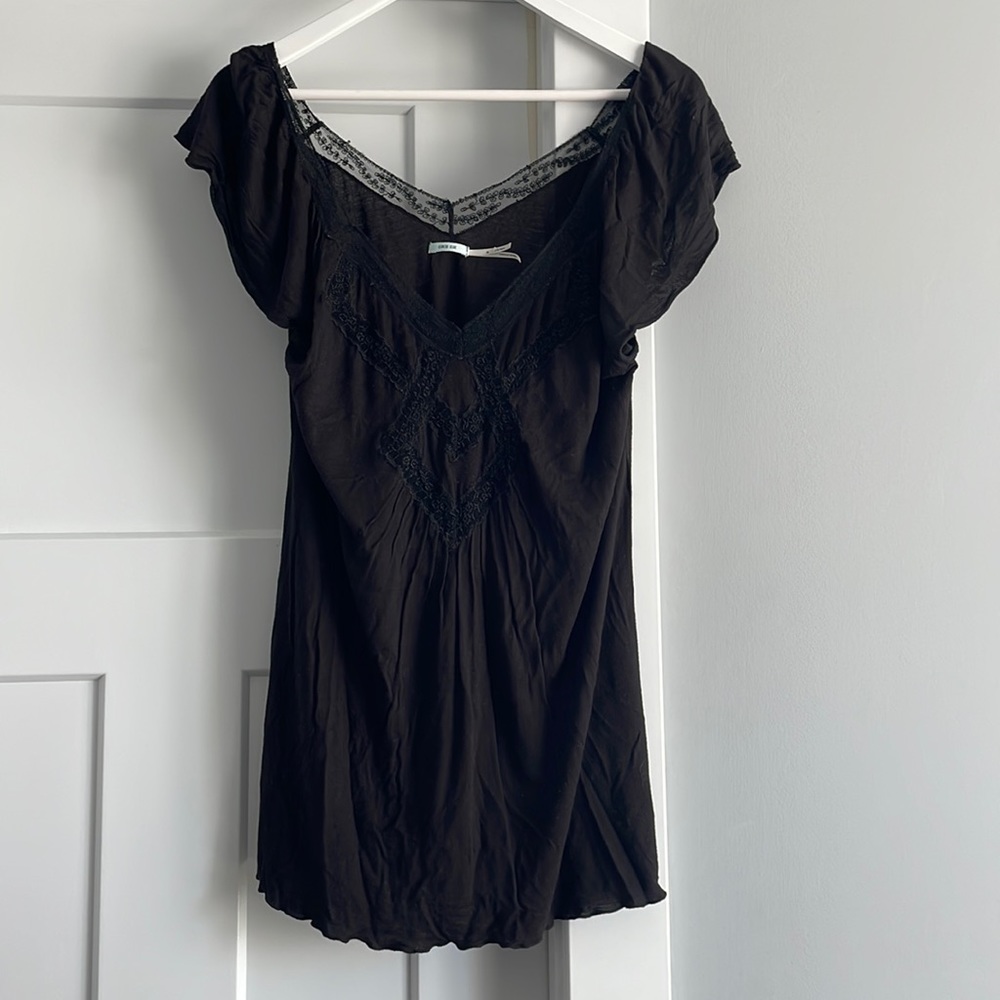 Black knit blouse.   Size M.  Flutter sleeves with lace detail